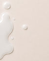 Textura de creme luminoso sobre fundo bege